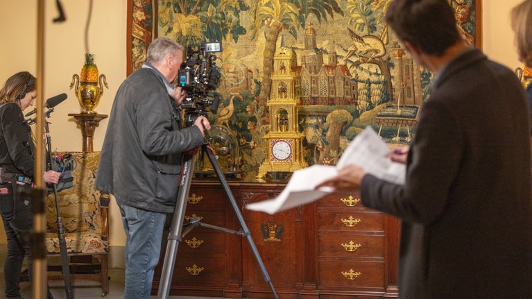 Camera crew filming the Pagoda Clock in the Living Room while the producer and Fiona Bruce look on.